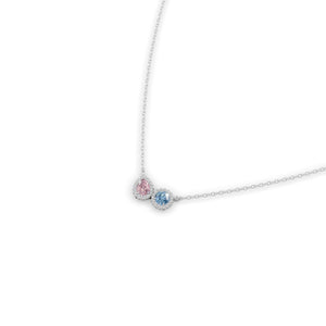 斜めから見たホワイトゴールド・プラチナカラーのヘイローデュオカラーダイヤモンドネックレス、シルバー・K10・K18対応 ラボグロウンダイヤモンド使用